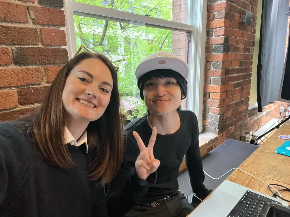 Two Vireo crew members taking a selfie on set