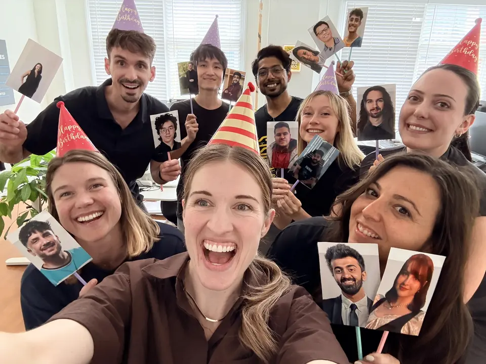 The Vireo team celebrating with party hats
